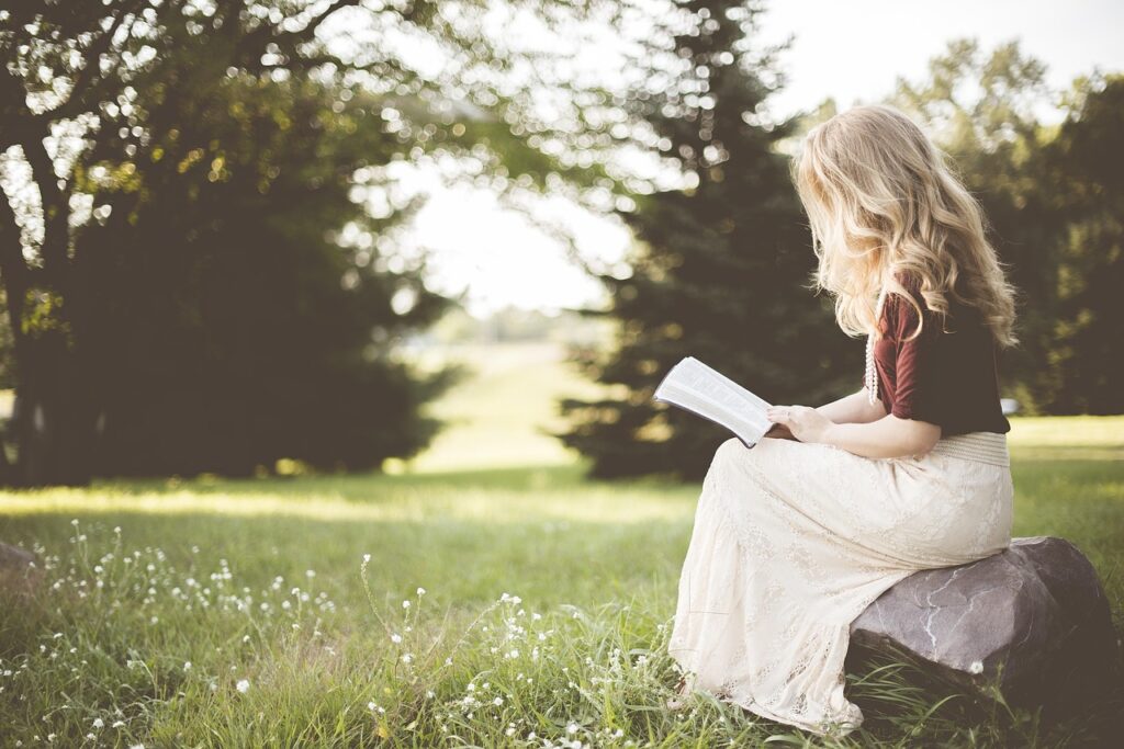 Why I have finally started blogging blonde, girl, book, reading, sit, sitting, young woman, reading a book, reading girl, nature, grass, outdoors, woman